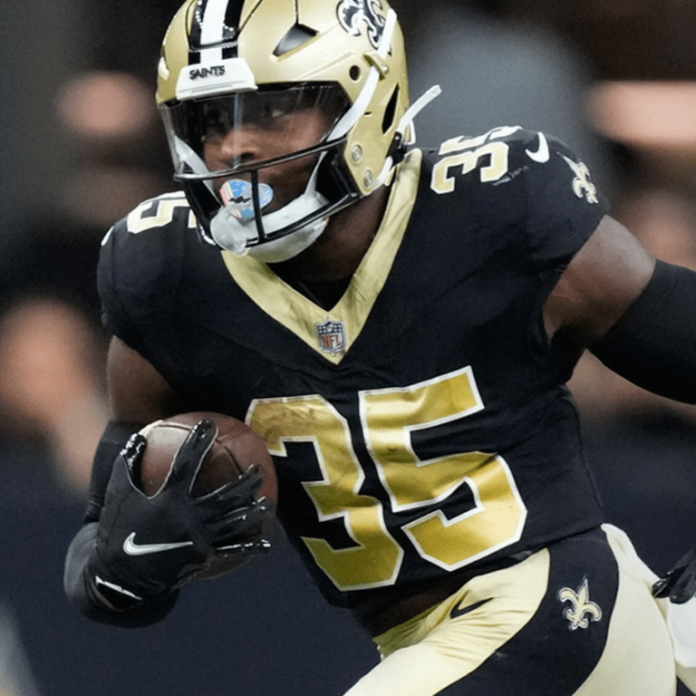 New Orleans Saints running back Ellis Merriweather (35) fist bumps with  staff during the Back Together Weekend fan appreciation initiative at the  NFL team's football training camp in Metairie, La., Saturday, July