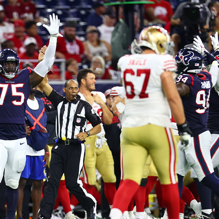 Houston Texans defensive end Adedayo Odeleye (75) joins the huddle