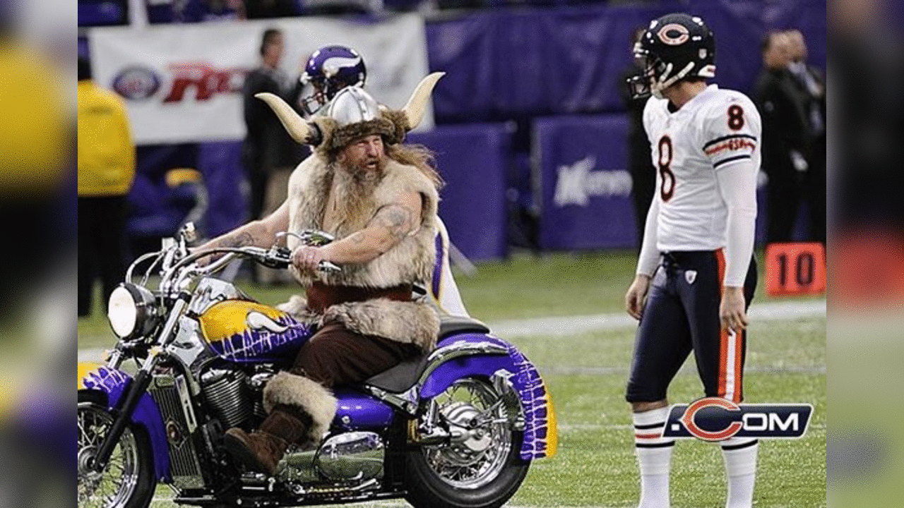 1/1/12 - Bears punter Adam Podlesh exchanges pleasantries with Ragnar the Viking before kickoff in Minnesota.