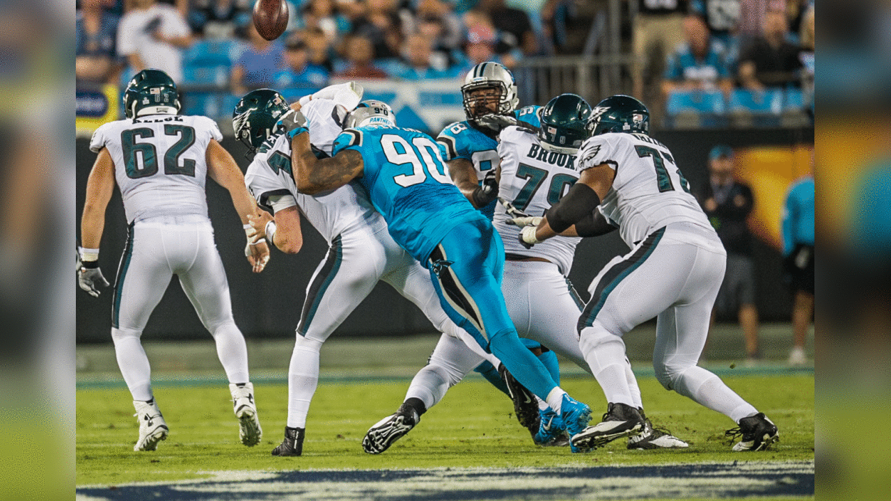 Carolina Panther Julius Peppers (90) sacks Philadelphia Eagle quarterback Carson Wentz at Bank of American Stadium on Thursday, October 12, 2017 in Charlotte, NC.