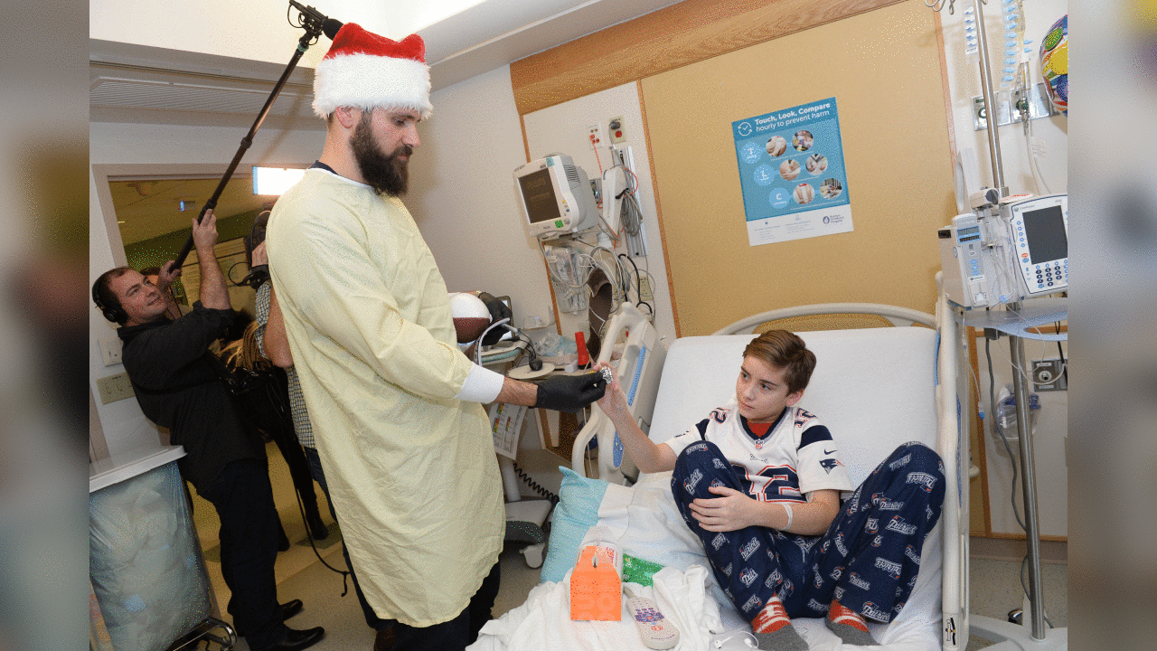 BOSTON, MA - DECEMBER 12: New England Patriot alumni Sebastian Vollmer visits with Mike at Boston Children's Hospital December 12, 2017 in Boston, Massachusetts. (Photo by Darren McCollester/Getty Images for Boston Children's Hospital)