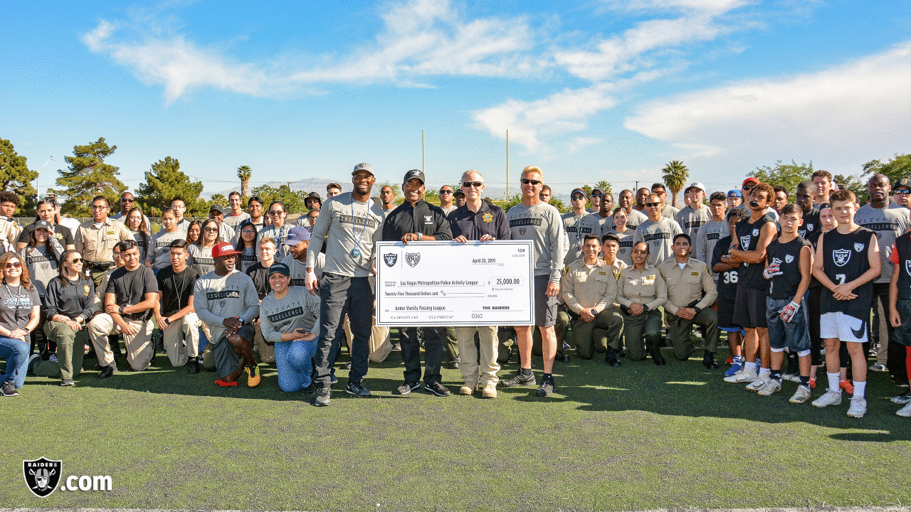 The Raiders, represented by alumnus Leo Gray, collaborate with the Las Vegas Metro Police Activities League to start a 7-on-7 NFL FLAG Passing League for high school junior varsity athletes, Saturday, April 20, 2019, at Rancho High School in Las Vegas, Nev.