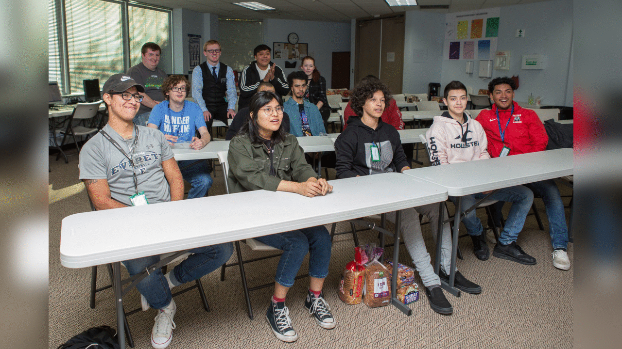 Youth from the Workforce Development learn that they will get the chance to see the Seahawks take on the Green Bay Packers at CenturyLink Field.