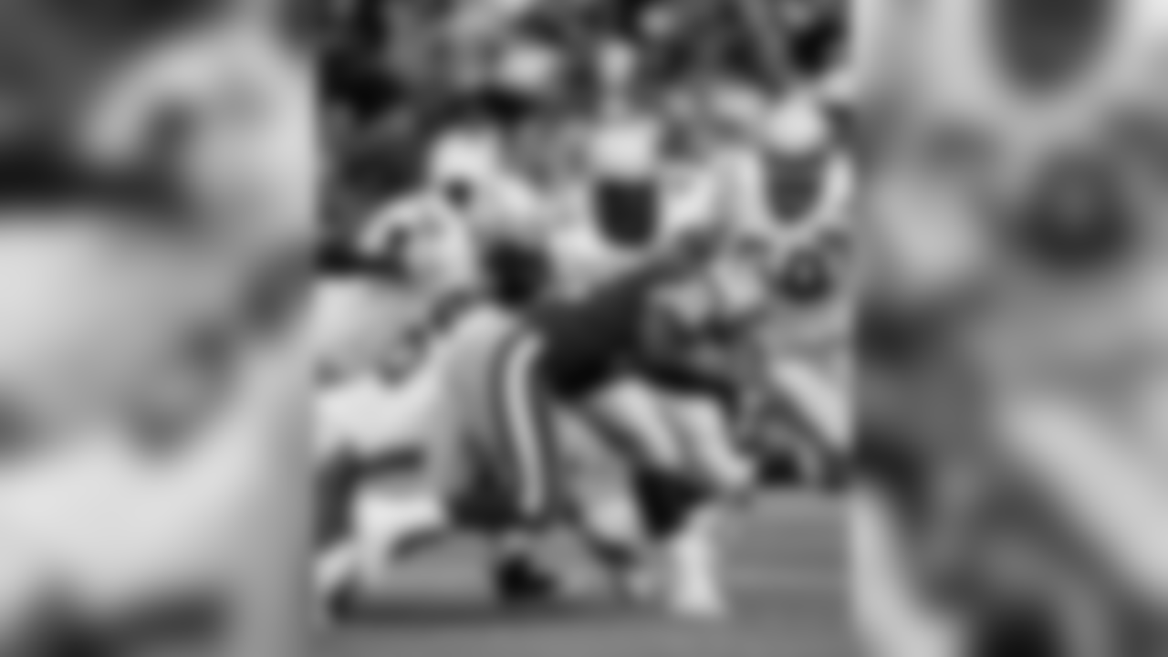 1994 -- 49ers running back Ricky Waters and Seahawks tackle Cortez Kennedy.