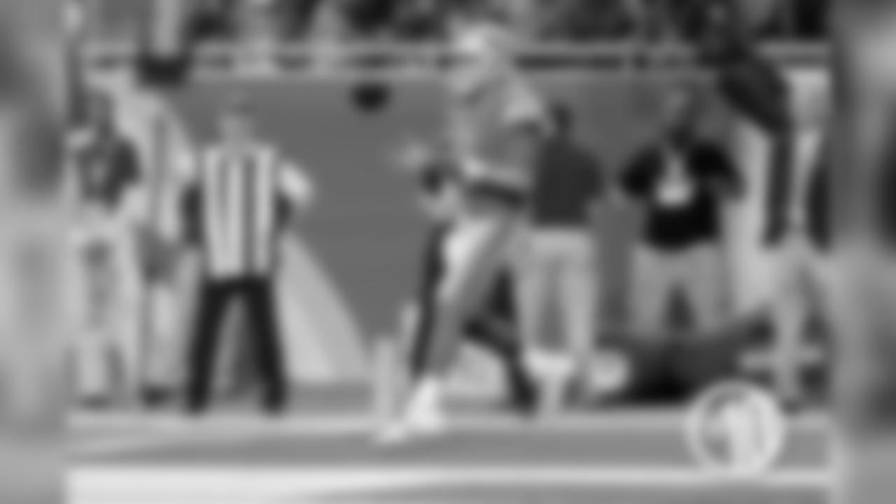 10. Detroit Lions quarterback Matt Stafford catches a two-point conversion pass.