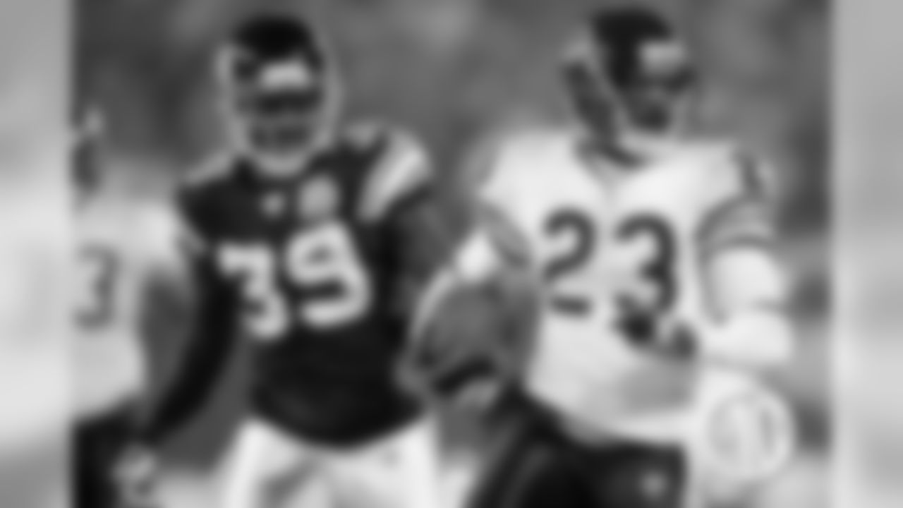 The Bears clinched their third NFC North title in six years and Devin Hester set an NFL record with his 14th career return for a touchdown when he brought back a punt 64 yards for a TD.