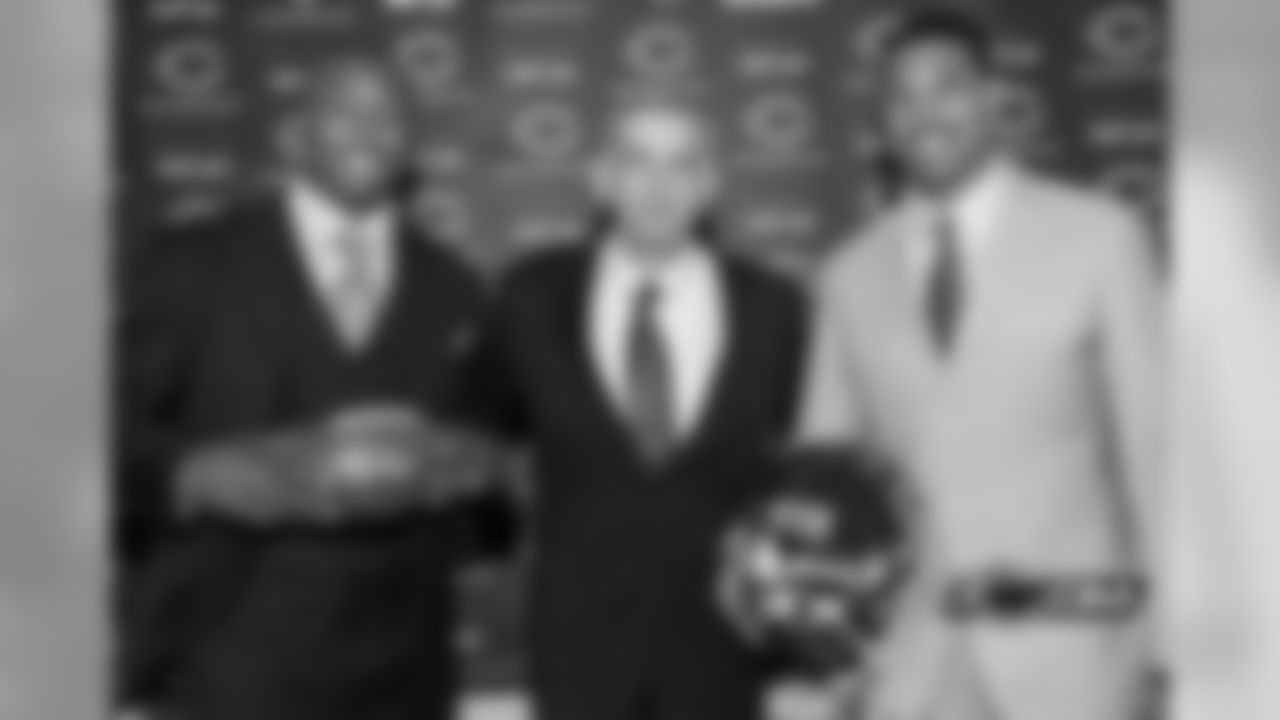 3/16/12 - Phil Emery poses with Brandon Marshall and Jason Campbell, the first players that he acquired as Bears GM.