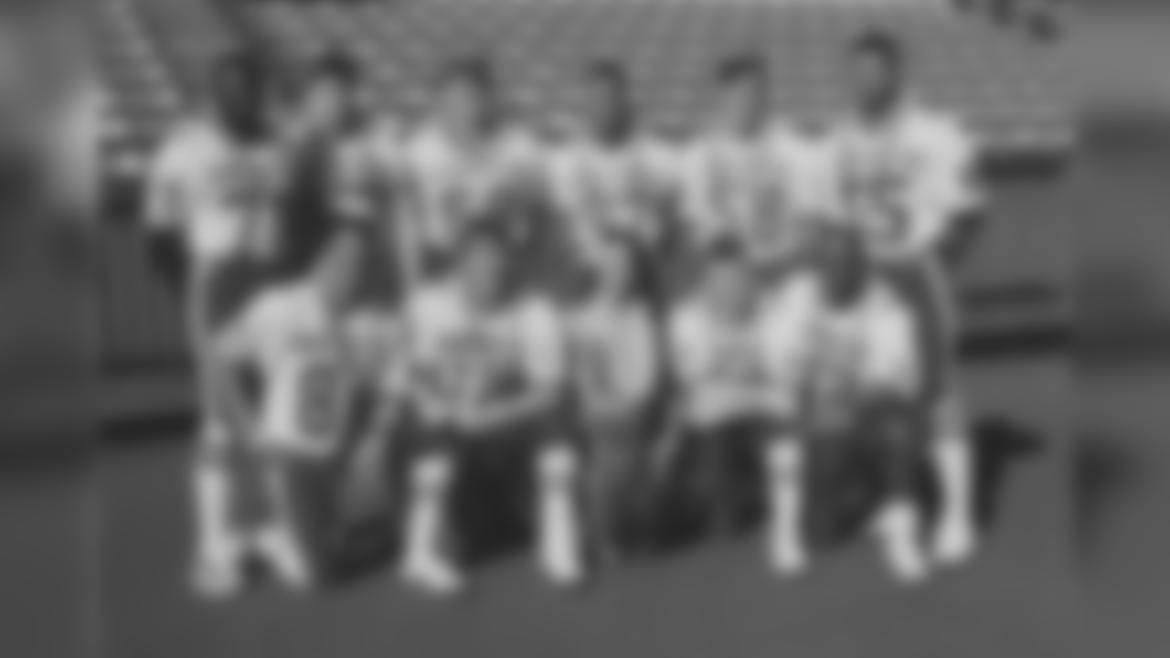 Back Row (L to R): DE Bruce Smith, C Kent Hull, T Will Wolford, LB Cornelius Bennett, LB Shane Conlan, LB Darryl Talley. Front Row (L to R): WR Andre Reed, QB Jim Kelly, WR Steve Tasker, RB Thurman Thomas (1990).