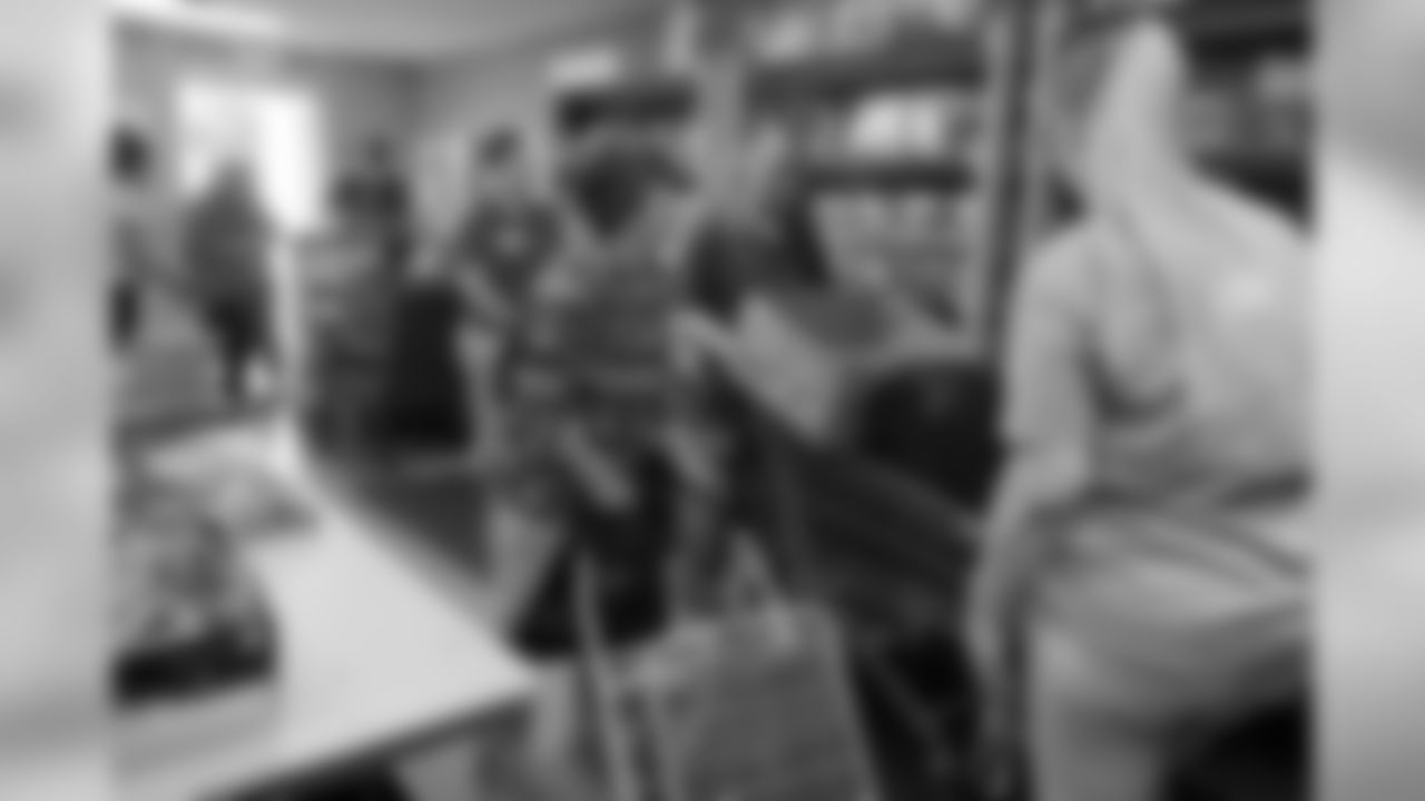 Volunteers at the Denver Inner City Parish help with the organization's food pantry operations during the inaugural Denver Day of Service on June 7, 2019.