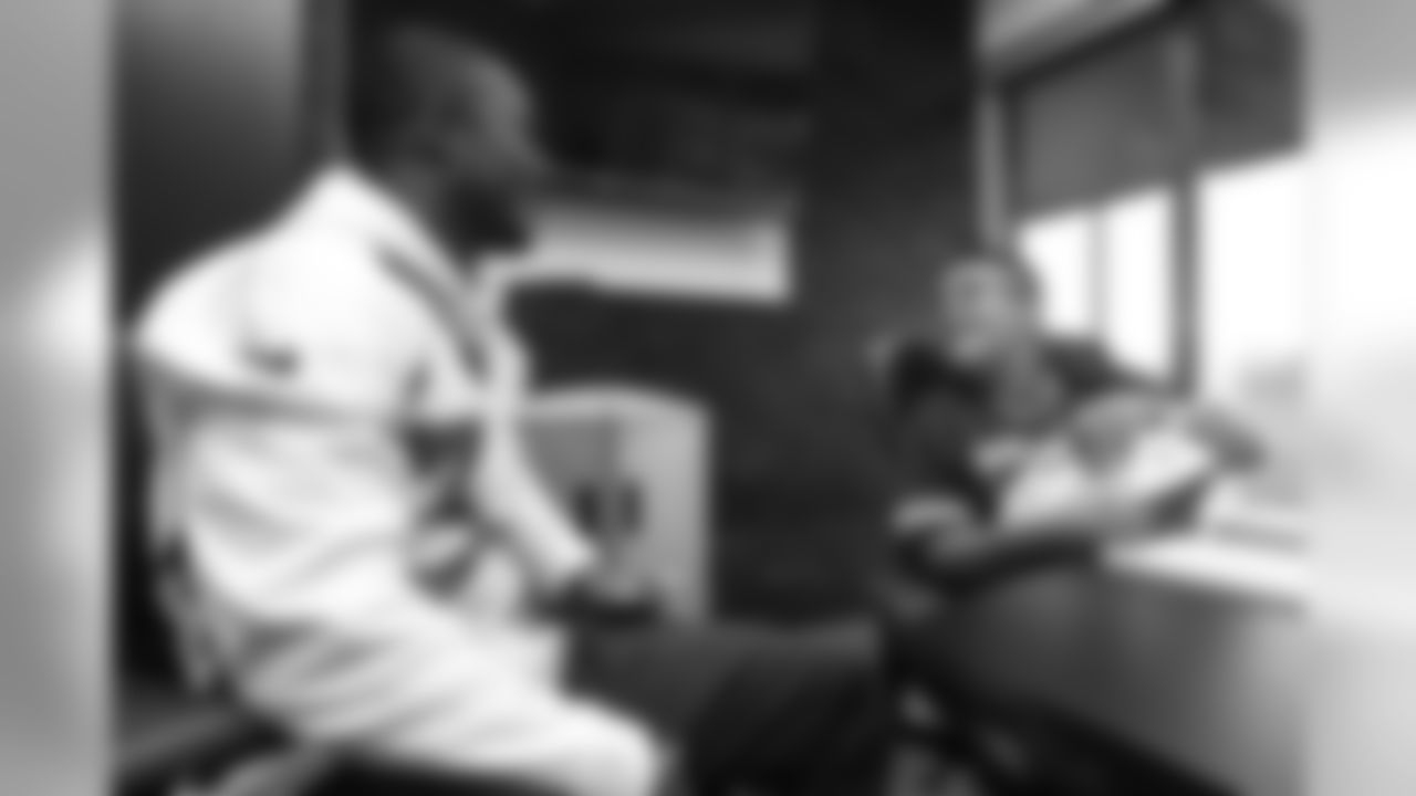 Will Parks meets Children's Hospital Colorado Junior Reporter Yovany for an interview after practice on October 10, 2018, at UCHealth Training Center.