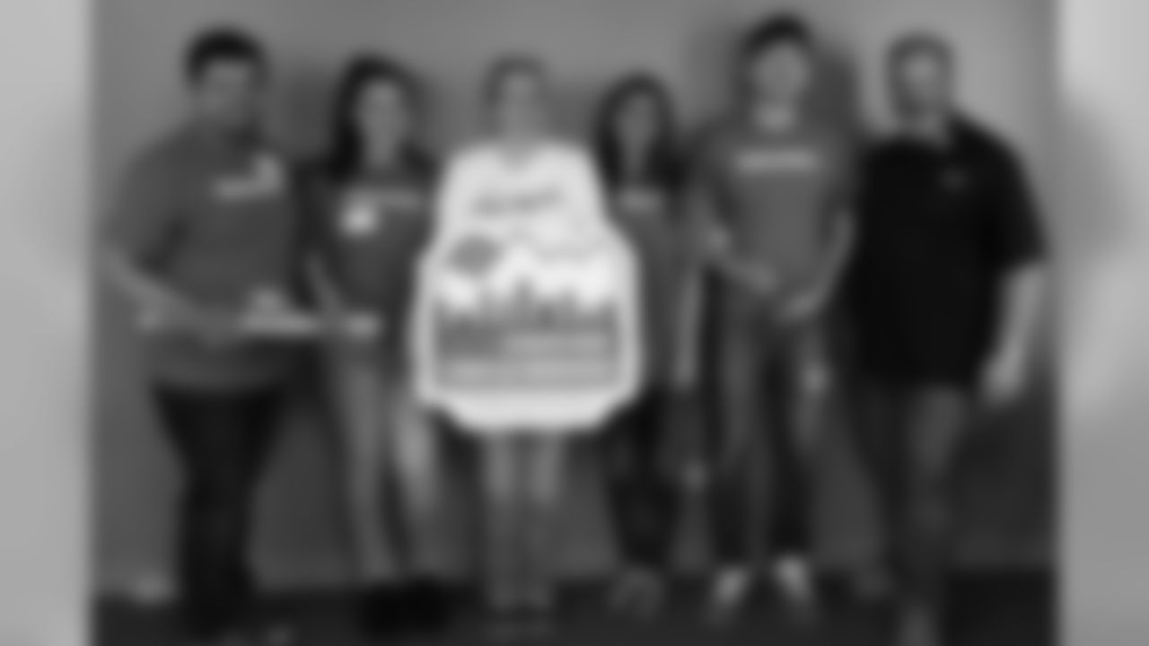 Volunteers at the Integrated Family Community Services location pose for a group photo during the inaugural Denver Day of Service on June 7, 2019.