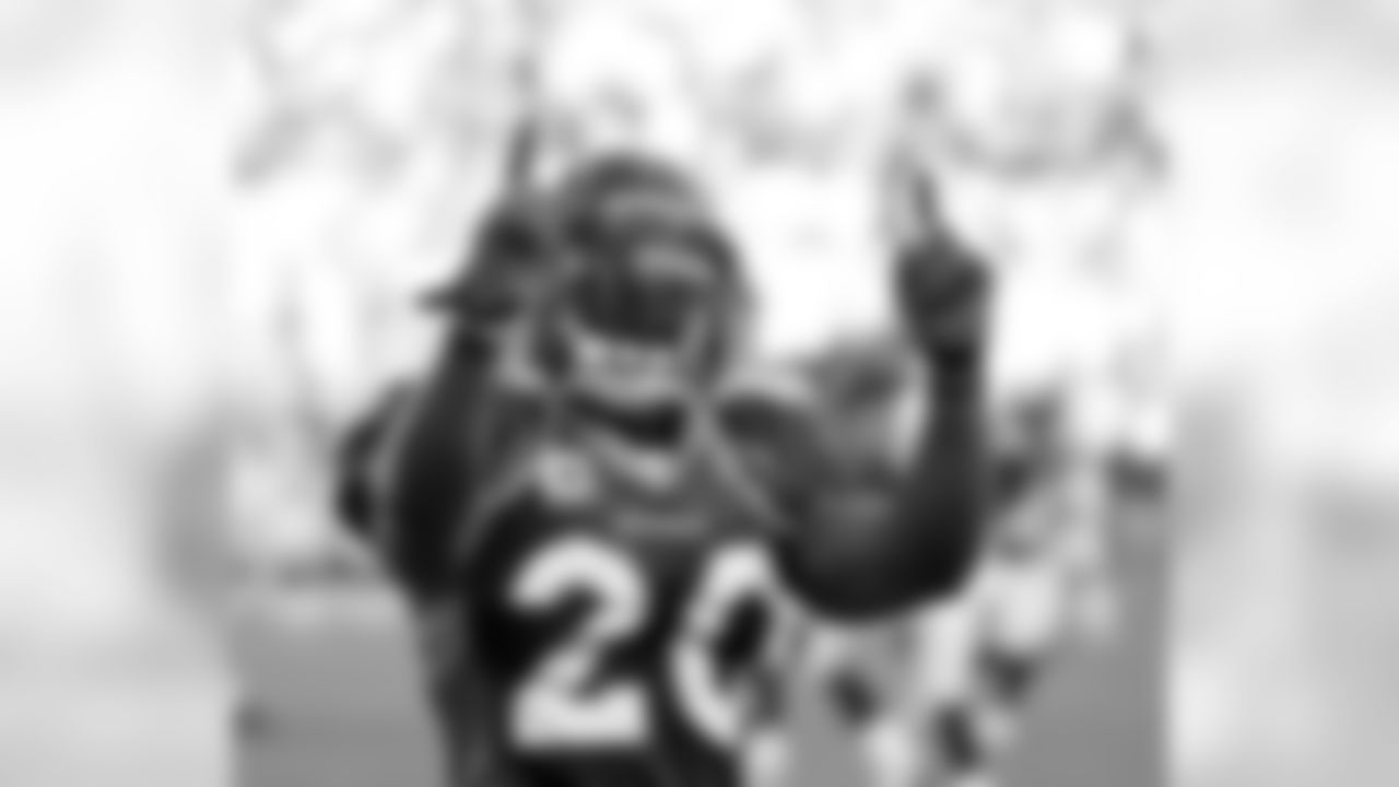 Denver Broncos Brian Dawkins (20) flashes one-and-one fingers to the fans after Denver defeated the Cincinnati Bengals 24-22 in the NFL game September 18, 2011 at Sports Authority Field at Mile High in Denver,CO.