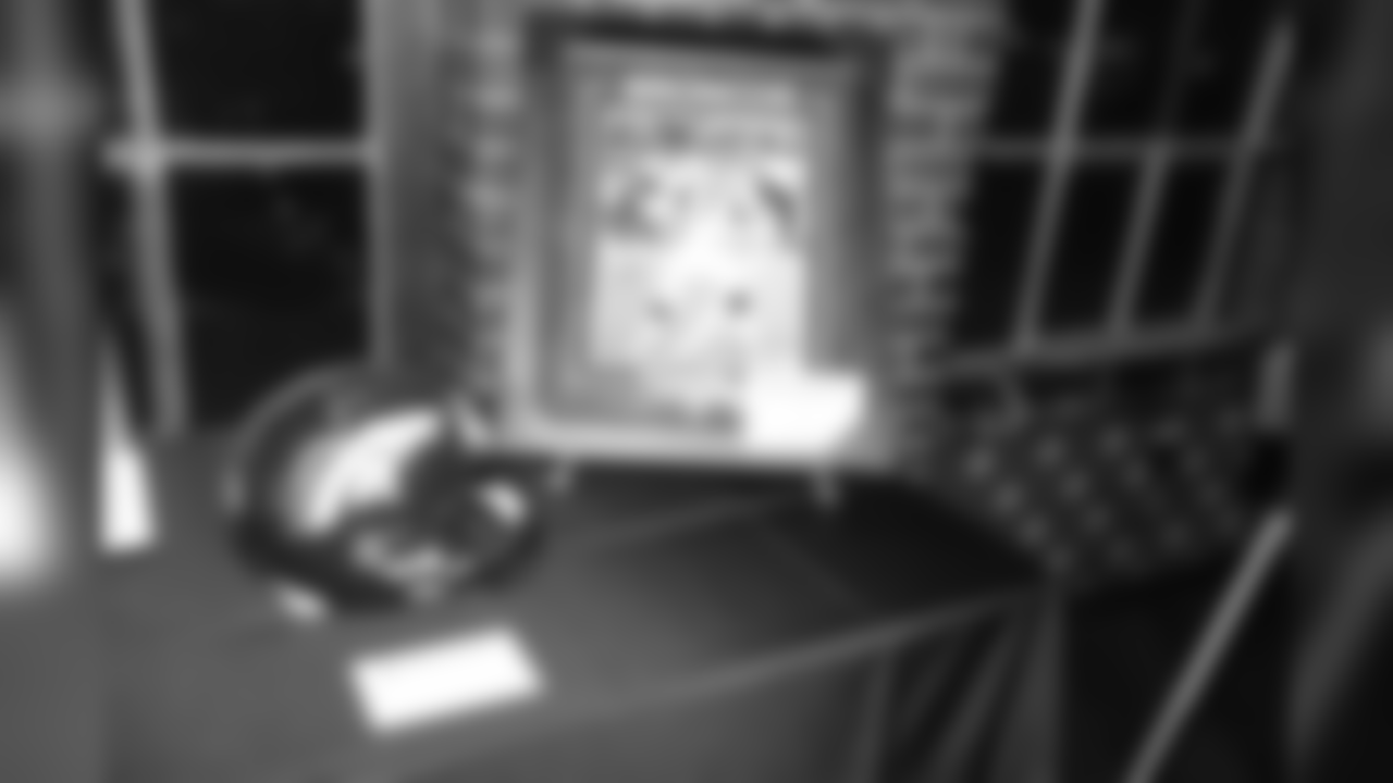 A signed Champ Bailey helmet and John Elway picture during Von's Vision at Mile High Station in Denver on November 5, 2018.