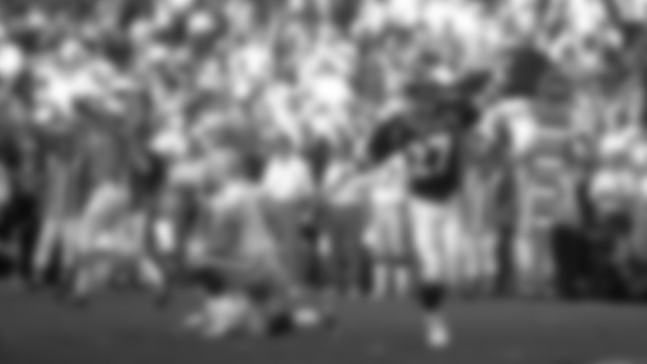 San Diego: Steve Atwater blitzes from the blindside and sacks Brett Favre on the Green Bay 33 during Green Bays first possession of the second quarter. The fumble was recovered by Neil Smith and led to a 51 yard field goal by Jason Elam against the Green Bay Packers at Qualcomm Stadium in San Diego, CA on January 25, 1998.
