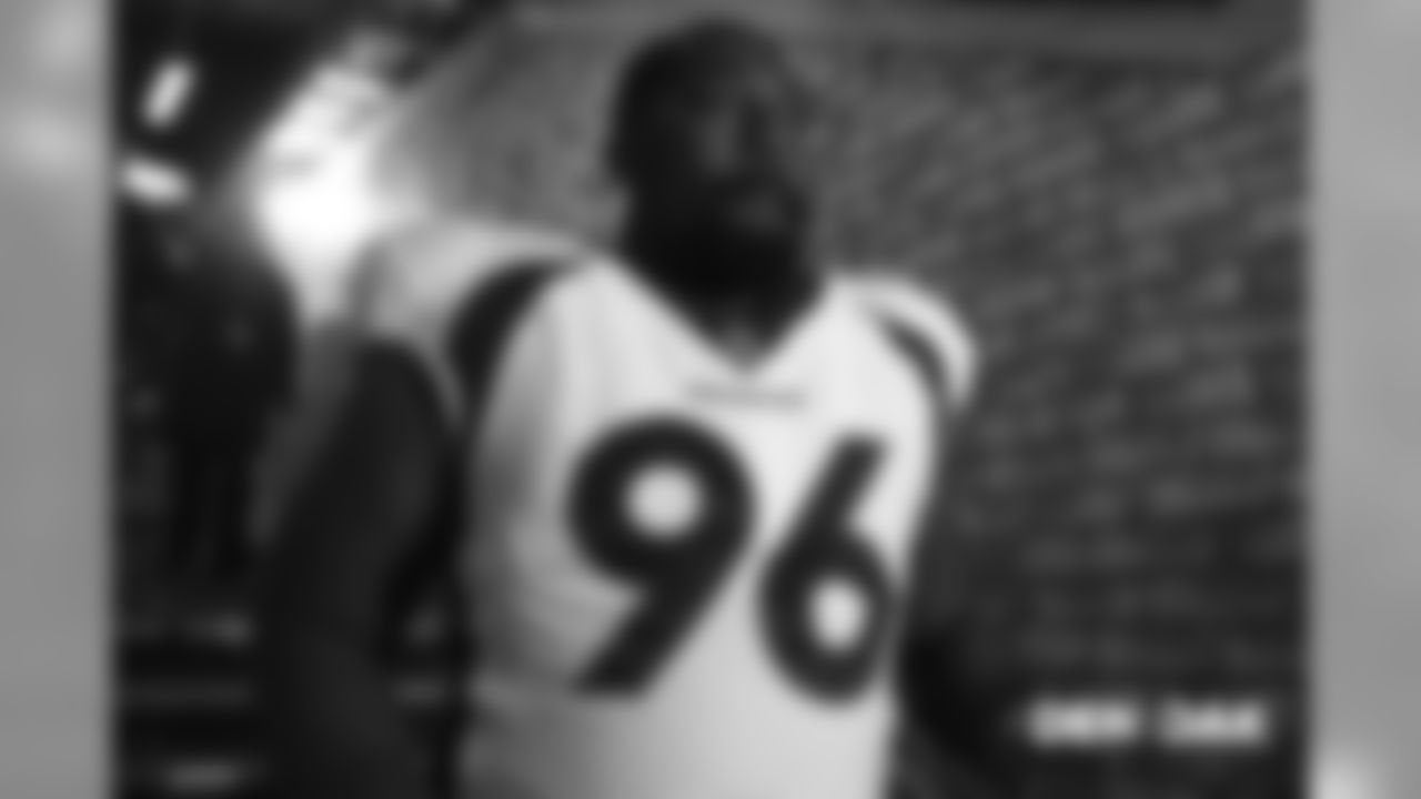 Shelby Harris walks to the field pregame before the Broncos' Week 16 game against the Oakland Raiders on December 24, 2018.
Photo by Ric Tapia
