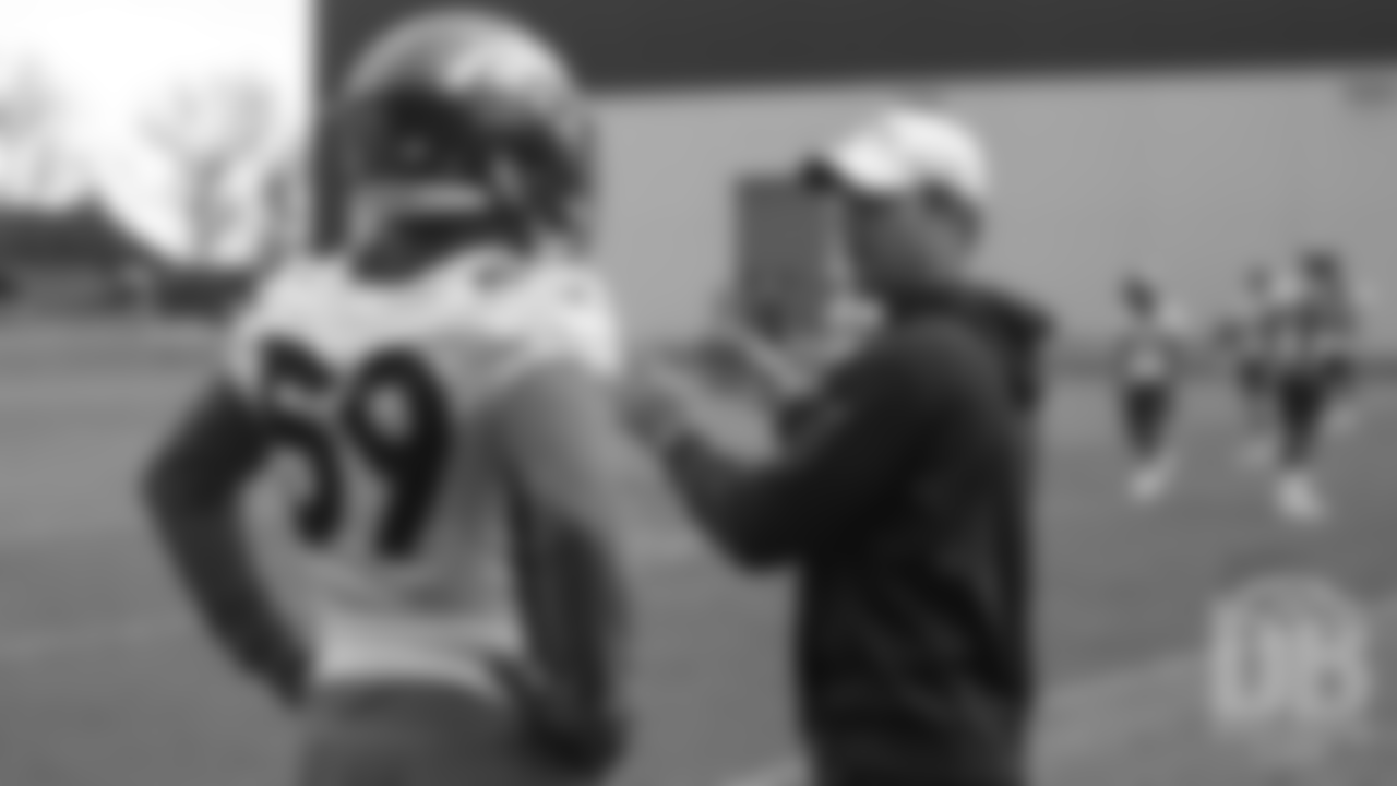 Outside linebacker Malik Reed and Outside Linebackers Coach Brandon Staley during the second day of rookie minicamp practice on May 11, 2019.