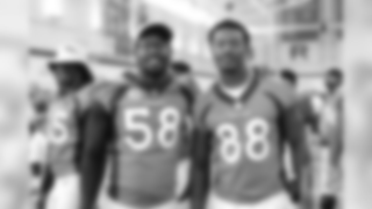 Von Miller and Demaryius Thomas at team photo day at UCHealth Training Center on September 15, 2018.