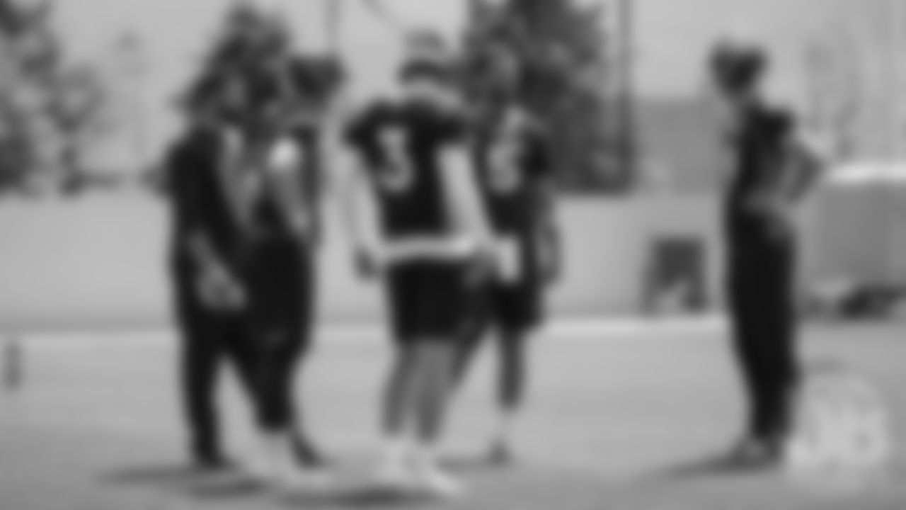 Quarterbacks Coach T.C. McCartney, Brett Rypien, Drew Lock, Joe Flacco and Kevin Hogan during the Broncos' second mandatory minicamp practice on June 5, 2019.