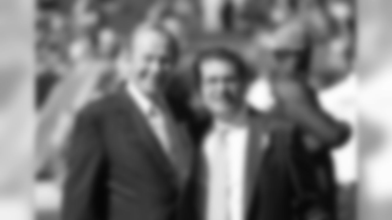 Denver Broncos owner Pat Bowlen and Washington Redskins owner Daniel Snyder before the NFL game at Sports Authority Field in Denver, CO on October 27, 2013.
