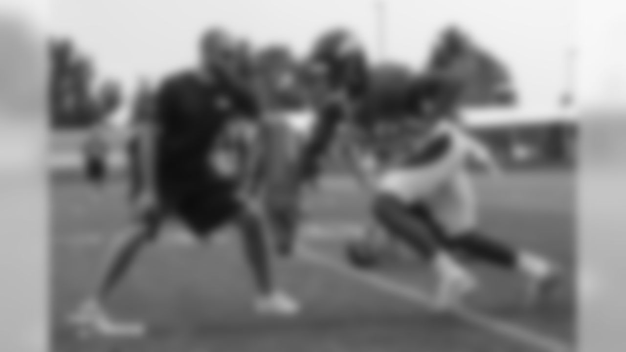 Wide Receivers Coach Zach Azzanni and wide receiver Demaryius Thomas (88) at the sixth day of training camp on August 3, 2018, at UCHealth Training Center.