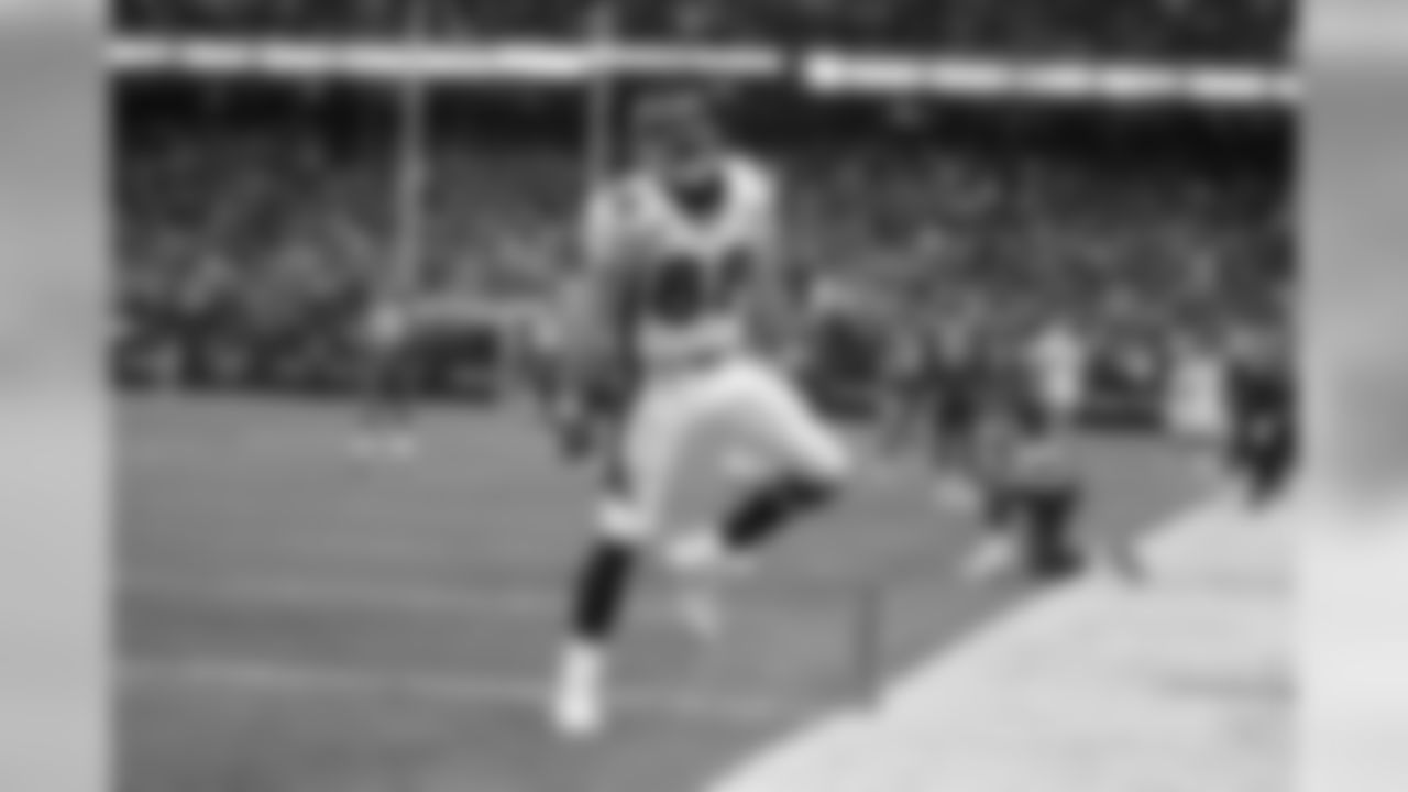 Denver Broncos tight end Tony Scheffler celebrates his 12 yard touchdown reception in the third quarter against the Houston Texans.