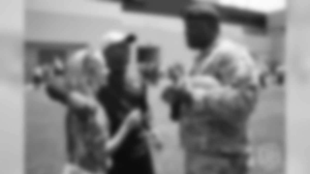 Head Coach Vance Joseph and his wife Holly greets U.S. Army chaplain Darius Holland after practice on June 12, 2018. Holland and Joseph are friends and were teammates during their days on the Colorado Buffaloes football team. The meet-and-greet with Holland and other members of the Army and Colorado Air National Guard was part of an event hosting servicemen and servicewomen with USAA and the Broncos Womens Organization.
Photo by Gabriel Christus