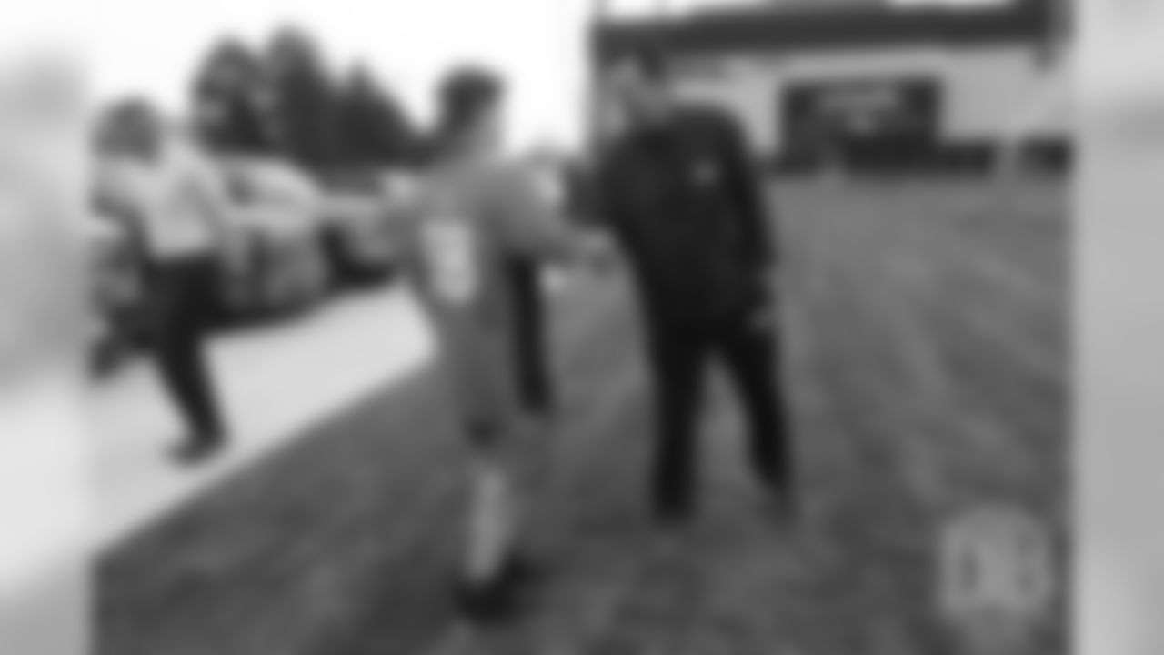 TJ, a 12-year-old fighting cystic fibrosis, wanted to be Von Miller for a day, and the Make-A-Wish Foundation helped make that dream come true on September 29, 2018. Here, TJ meets Senior Personnel Advisor Gary Kubiak at practice.