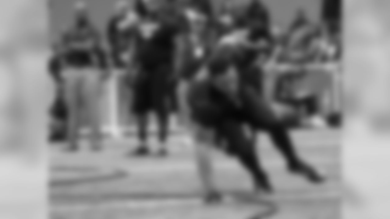 Shane Ray, drafted by the Broncos in the first round of the 2015 NFL Draft, performs a drill at Missouri's Pro Day.