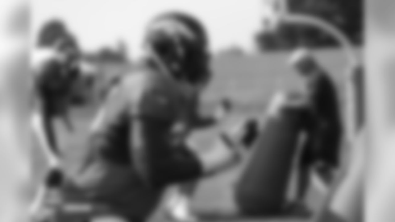 Tackle Menelik Watson (75) during the ninth day of training camp on August 7, 2018, at UCHealth Training Center.