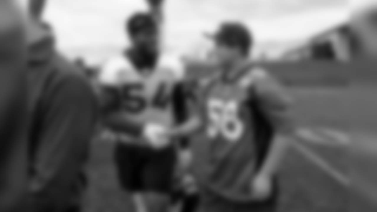 TJ, a 12-year-old fighting cystic fibrosis, wanted to be Von Miller for a day, and the Make-A-Wish Foundation helped make that dream come true on September 29, 2018. Here, TJ meets Brandon Marshall after practice.