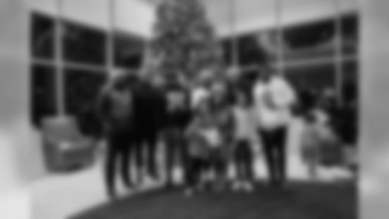 Domata Peko Sr. and his wife Anna and the rest of the defensive linemen hosted families the Pekos adopted for the holidays for a gift-giving experience at UCHealth Training Center on December 21, 2018.