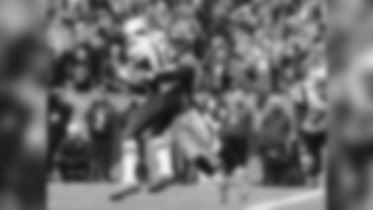 Jan. 24, 2016: Miller followed up his early interception by unleashing unholy terror upon Tom Brady as the Patriots looked to spark a comeback. On this play, Miller torched the Patriot's right tackle and lifted Brady off his feet for a sack at the Patriots' own 2-yard line. Behind Miller's 2.5-sack, 4-quarterback-hit, one-interception day, the Broncos earned a trip to Super Bowl 50. Photo by Ben Hays.