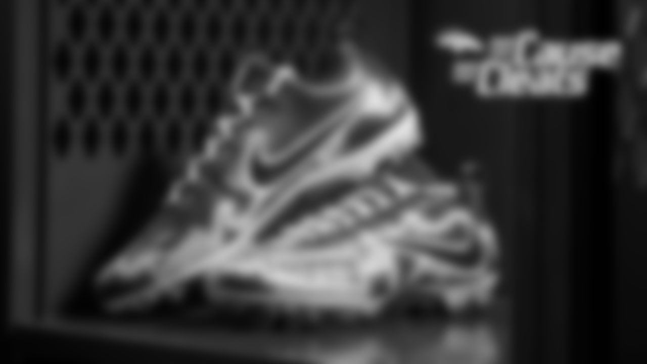 Dymonte Thomas' cleats represent the CHARGE Syndrome Foundation, an organization that promotes awareness and research for CHARGE syndrome, for My Cause My Cleats in 2018.
