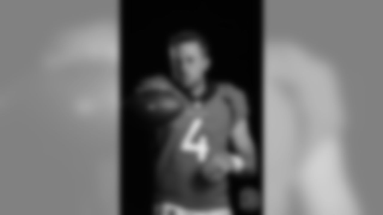 Quarterback Case Keenum (4) poses for photos during the media sessions with network photographers and videographers on June 12, 2018.
