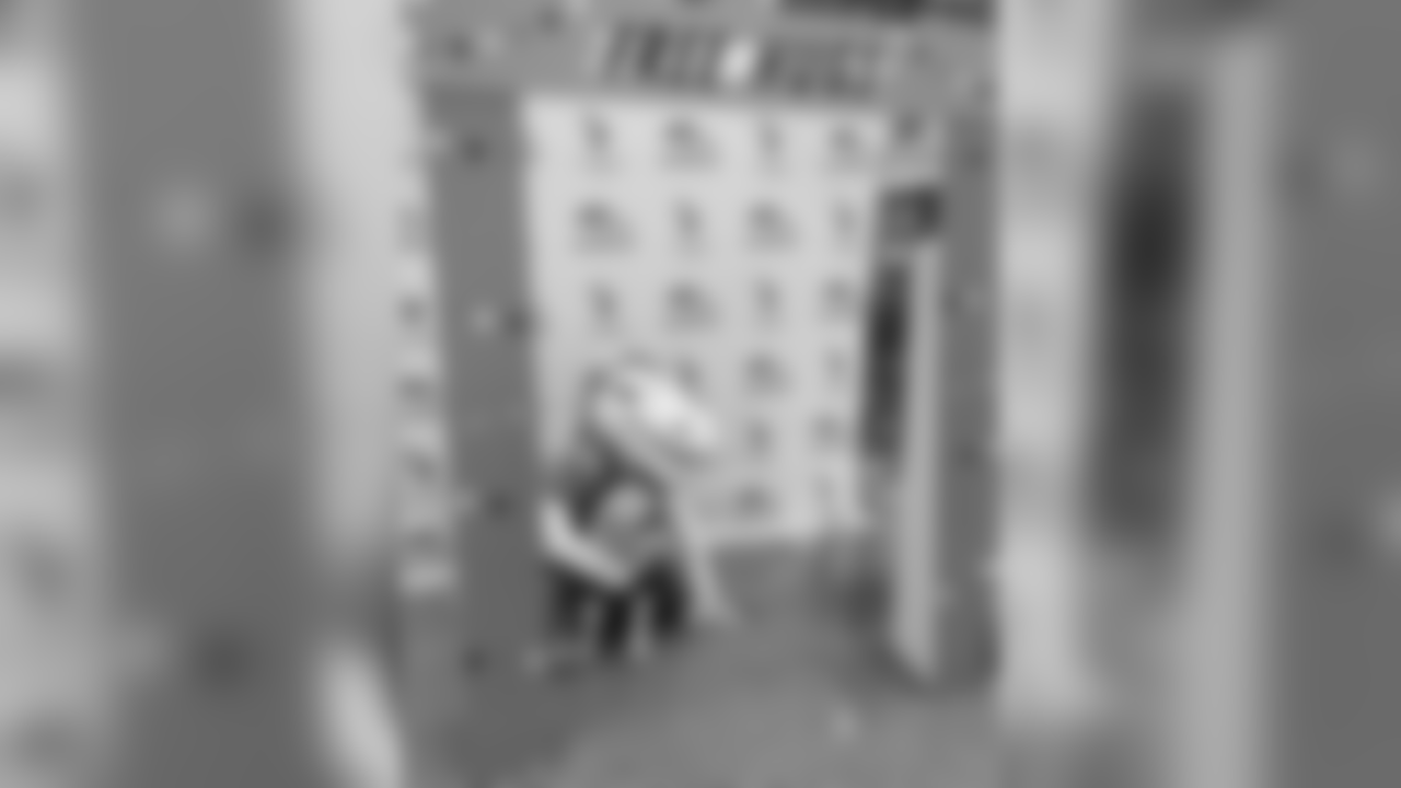 Miles the mascot gives out free hugs at a booth set up at Children's Hospital Colorado during a visit for Random Acts of Kindness Week on February 19, 2019.