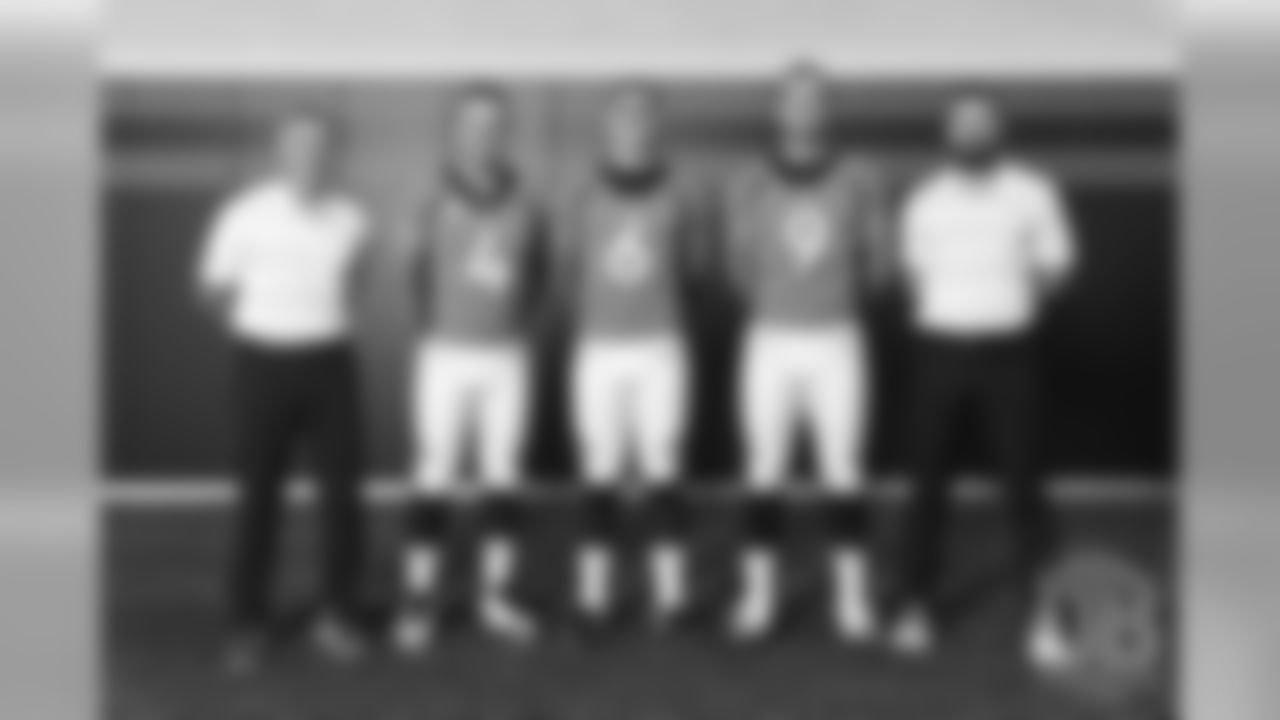 Quarterbacks Coach Mike Sullivan, Case Keenum, Chad Kelly, Kevin Hogan and Offensive Assistant/Quarterbacks Coach Klint Kubiak at team photo day at UCHealth Training Center on September 15, 2018.