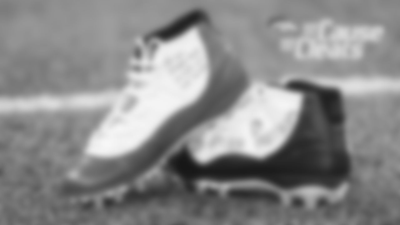 DeMarcus Walker's cleats represent Children's Hospital Colorado and were designed by children from the hospital for My Cause My Cleats in 2018.