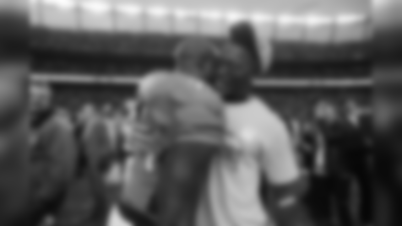 Demaryius Thomas celebrates with DeMarcus Ware after the Broncos beat the New England Patriots in the AFC Championship Game on Jan. 24, 2016.