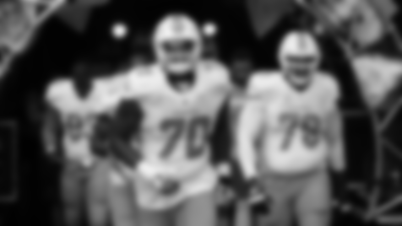 Miami Dolphins tackle Ja'Wuan James (70) and offensive tackle Branden Albert (76)enter the field, before an NFL football game against the Arizona Cardinals, Sunday, Dec. 11, 2016, in Miami Gardens, Fla. (AP Photo/Wilfredo Lee)