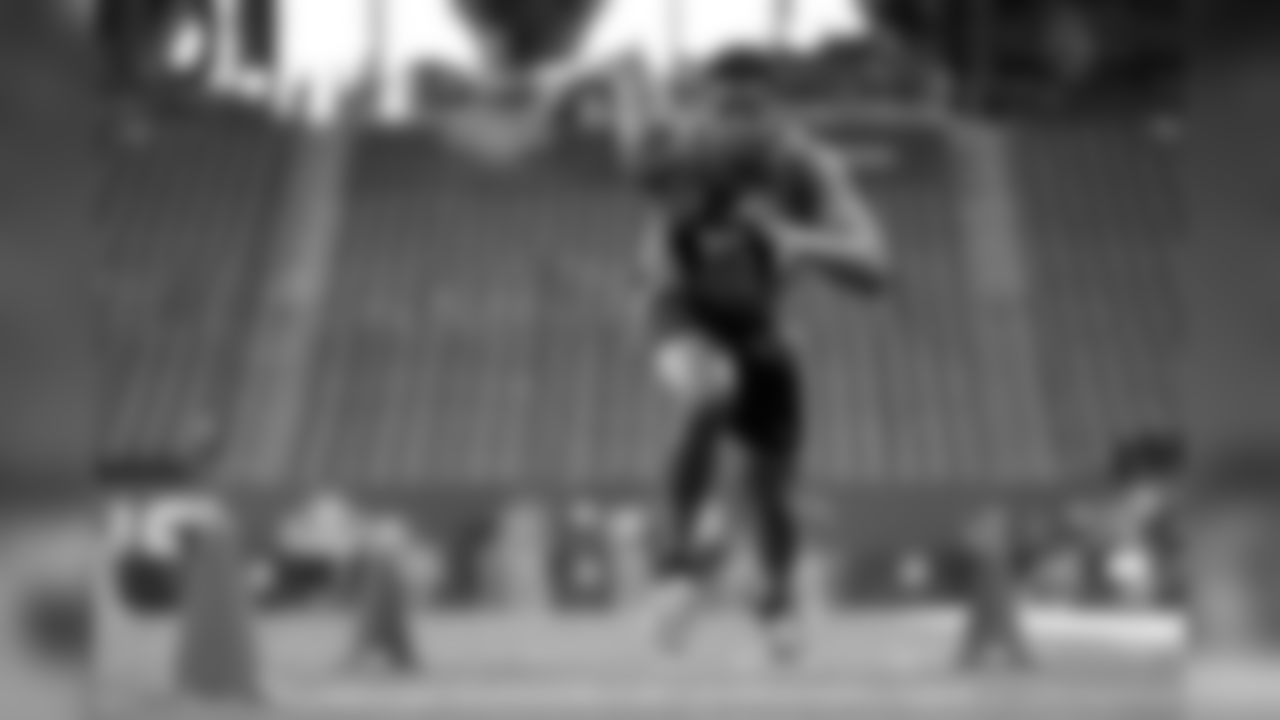 Florida State quarterback Jameis Winston runs a drill at the NFL football scouting combine in Indianapolis, Saturday, Feb. 21, 2015. (AP Photo/Julio Cortez)