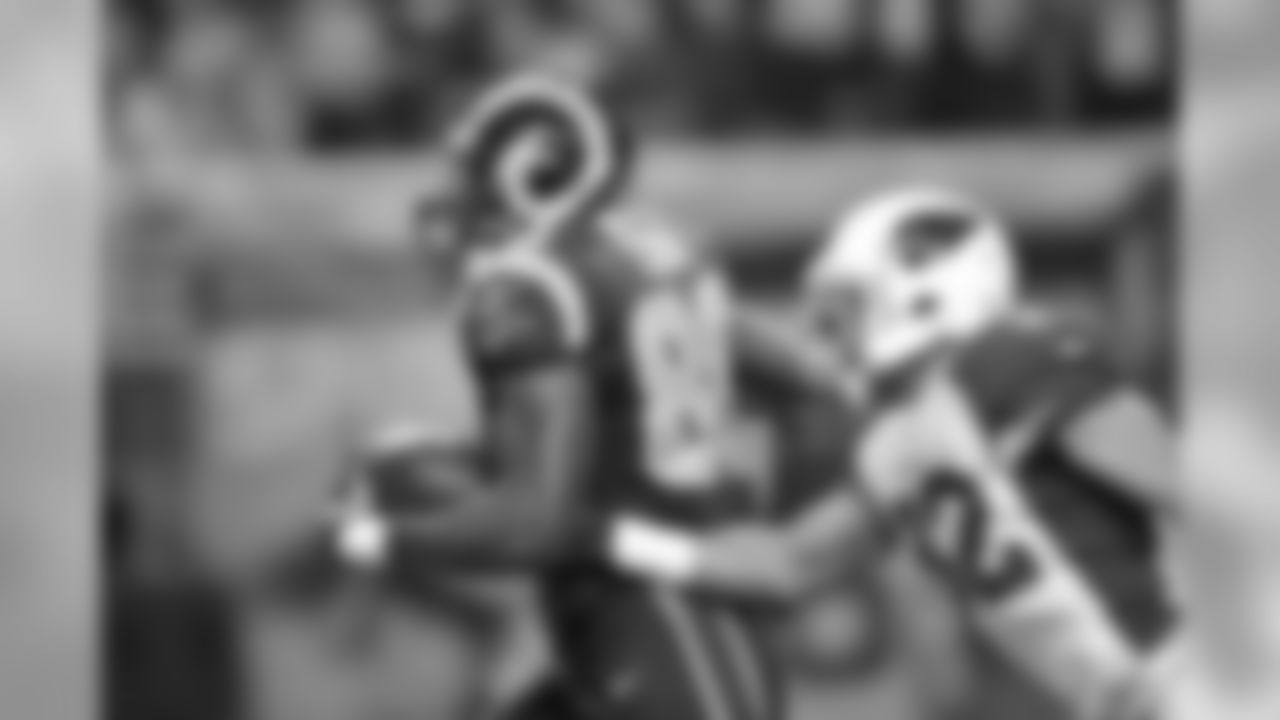 S Tyrann Mathieu pops the ball loose from Rams TE Jared Cook