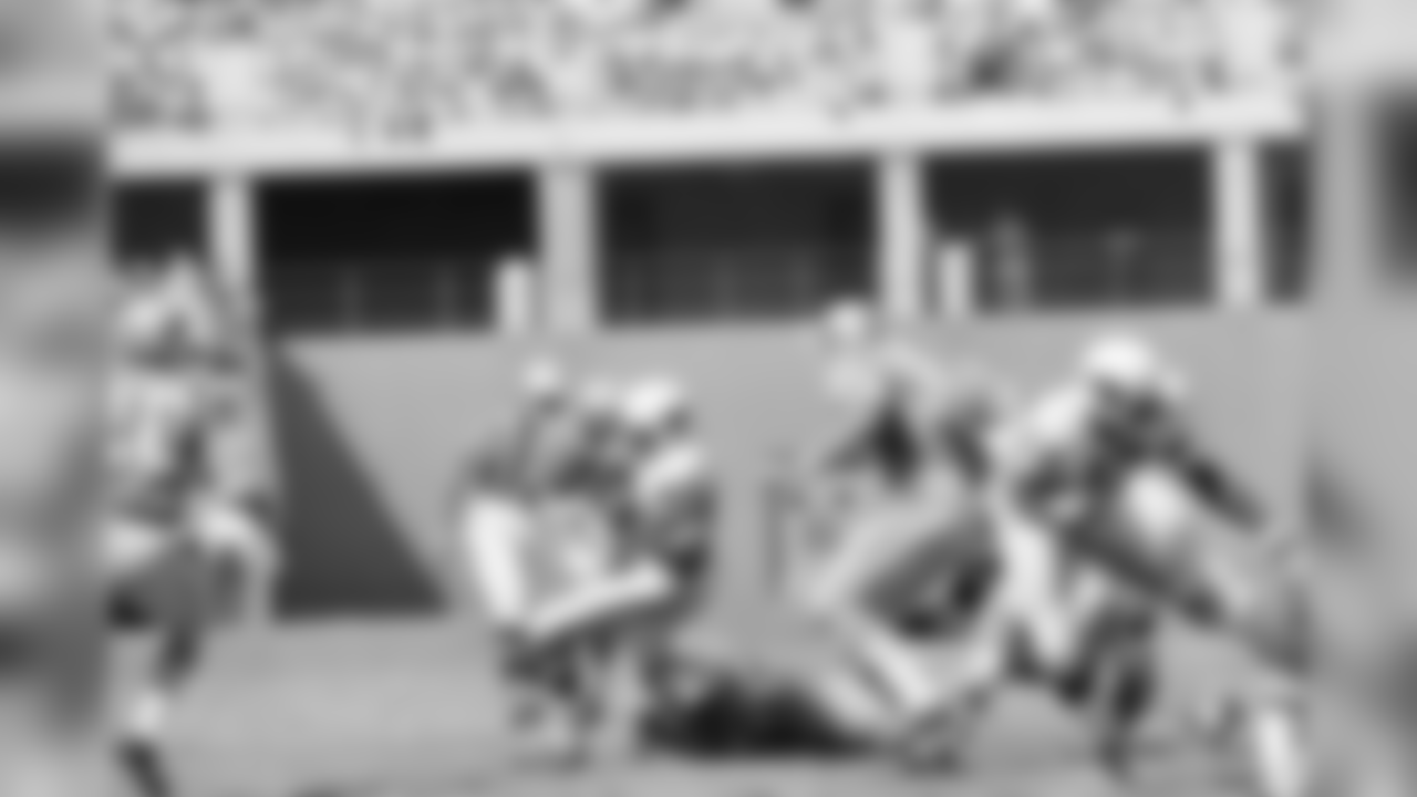 The Cardinals Johnny Roland gained only one yard on this second quarter play against the Lions, Sunday, Oct. 1, 1967, St. Louis, Mo. Detroiters are Wayne Walker (55), Mike Lucci, ground, and Darris McCord, rear. Cards won 38-28.