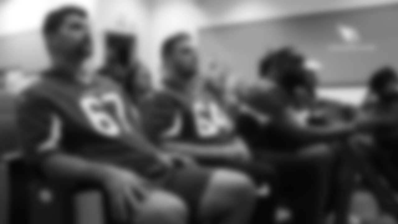 G Justin Pugh (left), C Mason Cole (center) and T Korey Cunningham listen to a presentation at Luke Air Force Base