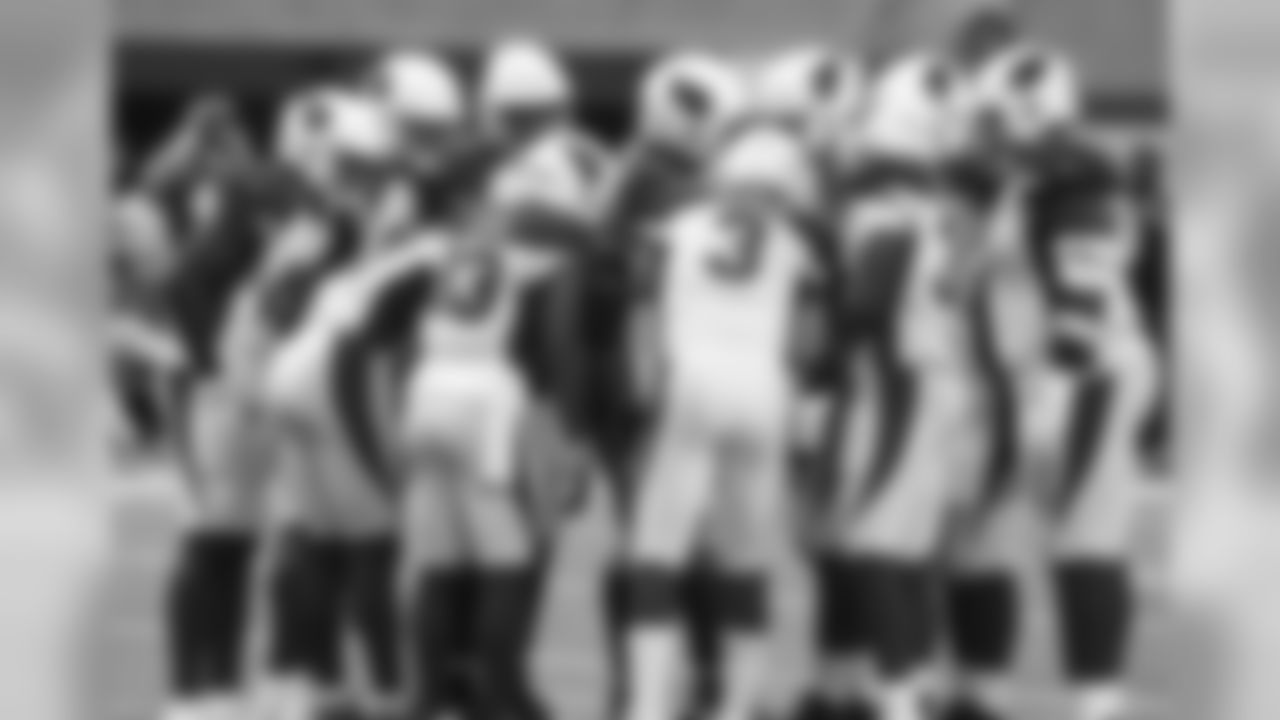 Arizona Cardinals quarterback Josh Rosen (3) calls a play in the huddle during the first half of an NFL football game against the Minnesota Vikings, Sunday, Oct. 14, 2018, in Minneapolis.