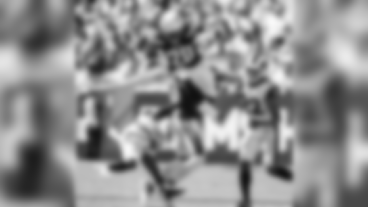 Melvin Gordon leaping over Los Angeles Rams player at LA Memorial Coliseum on Sunday, September 23, 2018.
