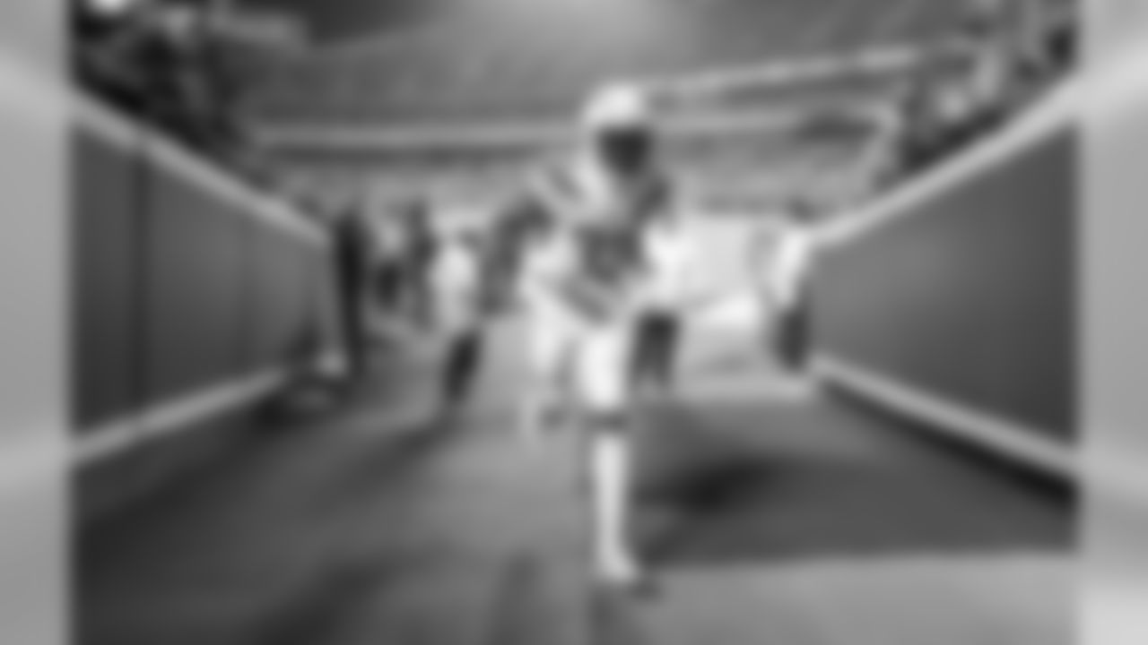 Derwin James runs back to the locker room after warming up at Arrowhead Stadium before the Thursday night matchup against the Kansas City Chiefs.