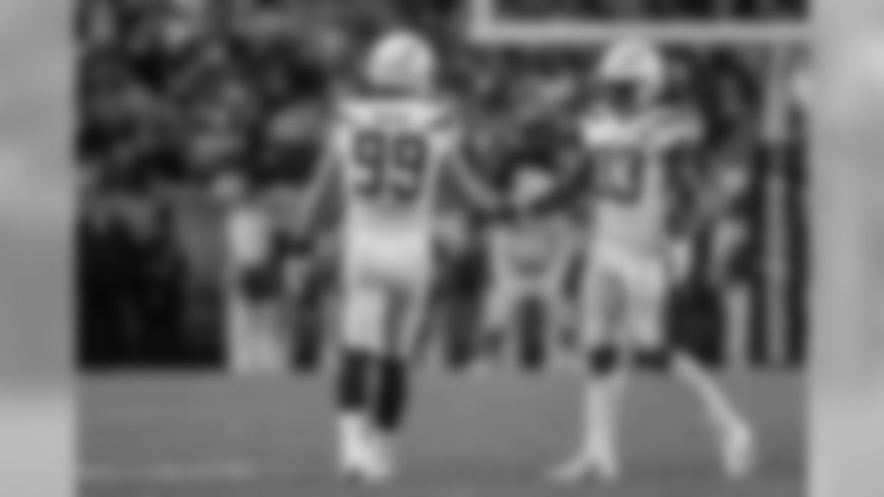 Joey Bosa and Derwin James shake hands after Bosa's sack of Case Keenum during the Week 17 contest against the Denver Broncos.