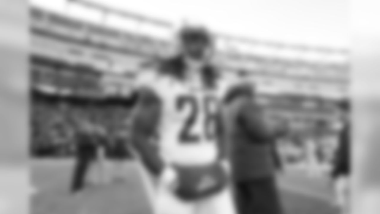 Melvin Gordon on the field before the Divisional Round matchup against the New England Patriots at Gillette Stadium.