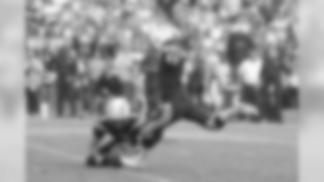 Michael Badgley kicks a field goal during the Week 11 matchup against the Denver Broncos from ROKiT Field at StubHub Center.