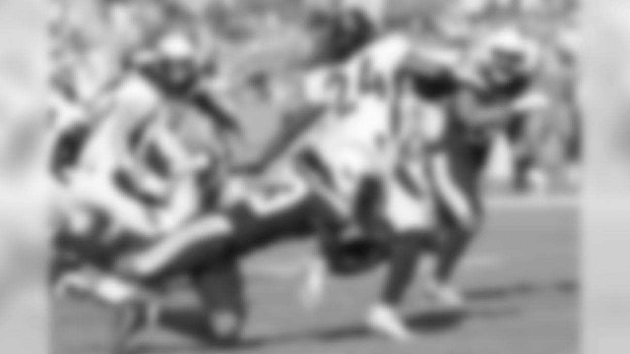Rayshawn Jenkins tackles Adam Jones on a kickoff return during the Week 11 matchup against the Denver Broncos from ROKiT Field at StubHub Center.